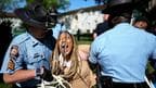 An anti-war protestor being arrested at the Emory University in Atlanta. 